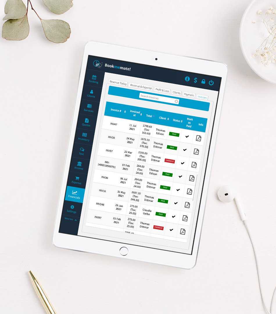 Tablet lying on table with Bookmemate`s list of invoices shown