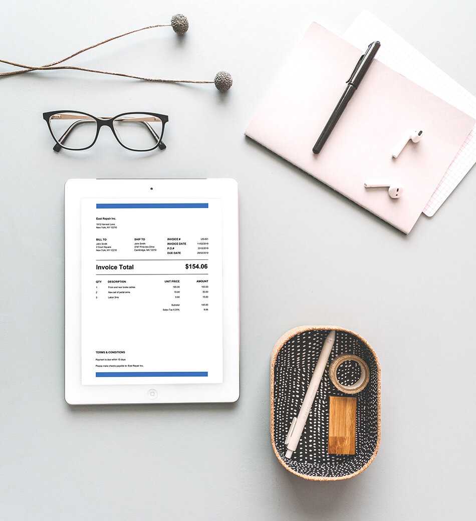 Tablet lying on table with a Bookmemate invoice shown